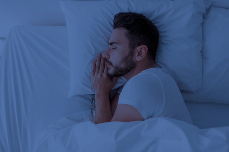 Healthy sleeping, sleep hygiene concept — man sleeping in comfy bed