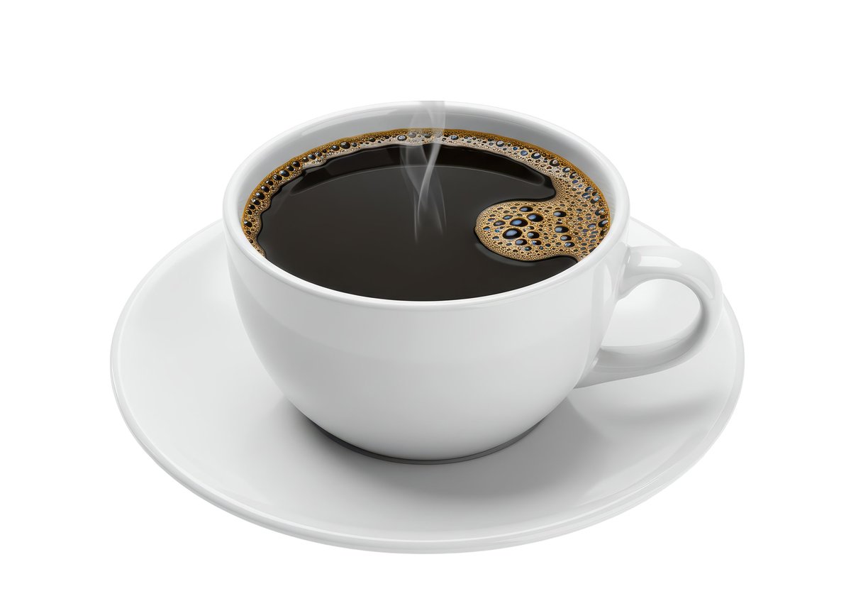 Freshly brewed coffee in a ceramic cup with steam rising