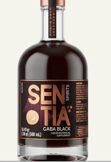 Bottle of Senota Spirits Gaba Black liquid botanical supplement with bronze cap and dark label on white background